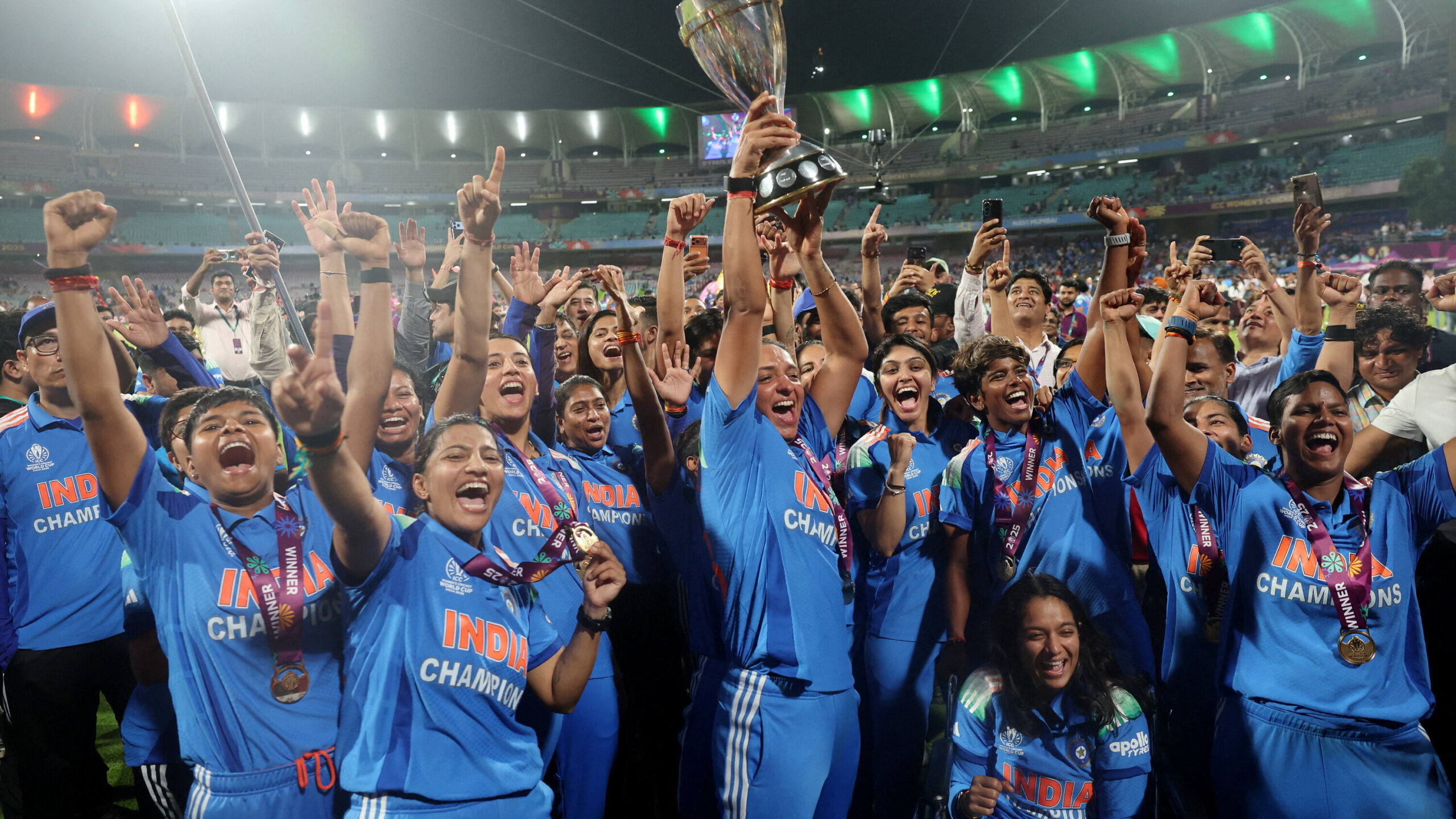 Indian women’s cricket team lifting the ICC Women’s World Cup 2025 trophy after defeating South Africa.